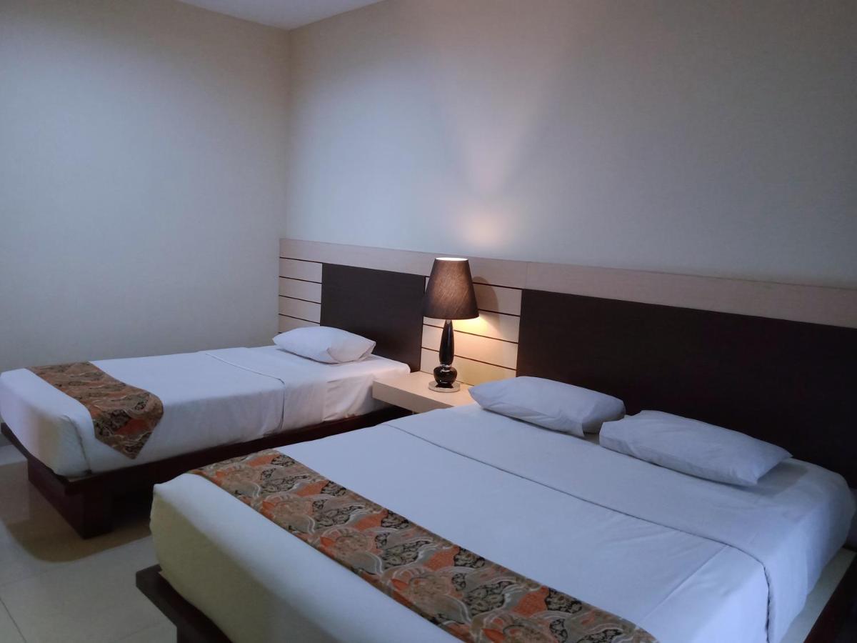 Hotel Pondok Asri ตาวังมางู ภายนอก รูปภาพ