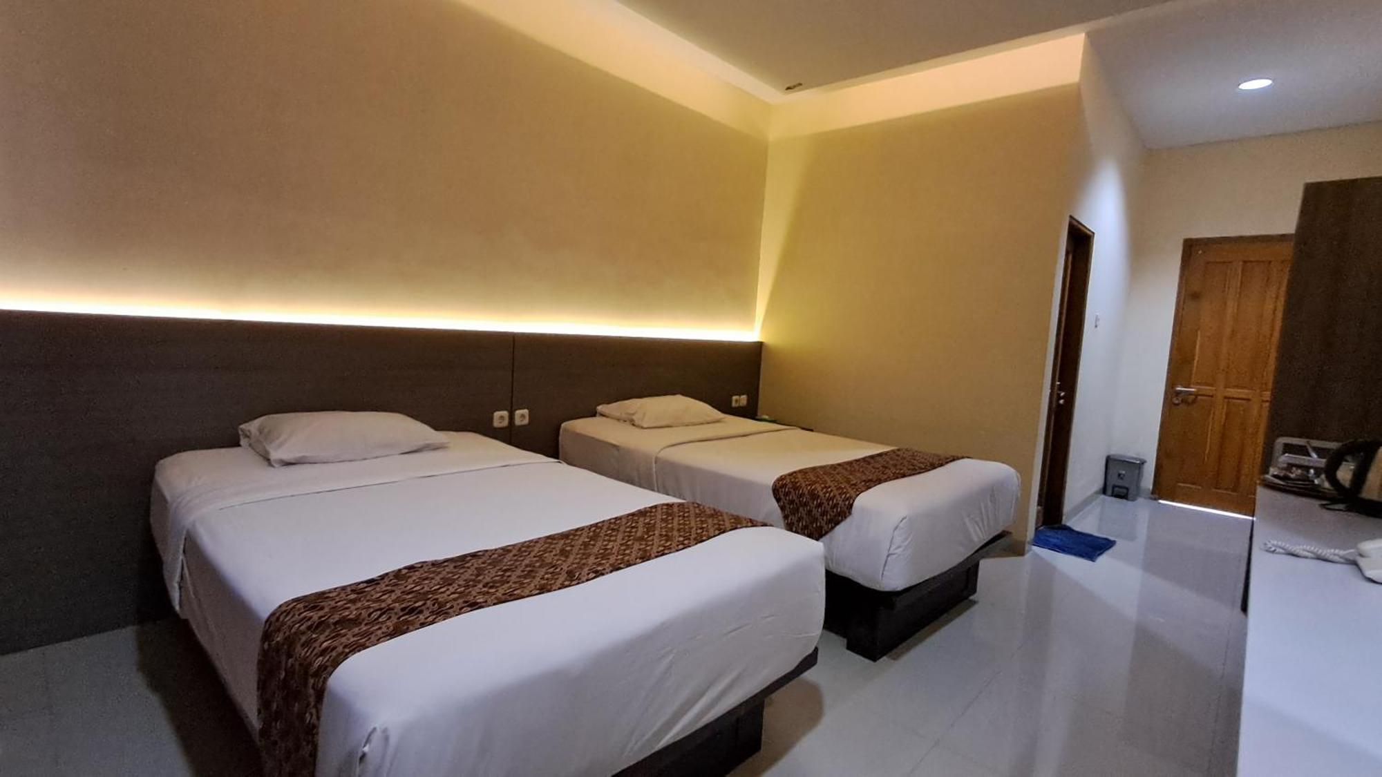 Hotel Pondok Asri ตาวังมางู ภายนอก รูปภาพ