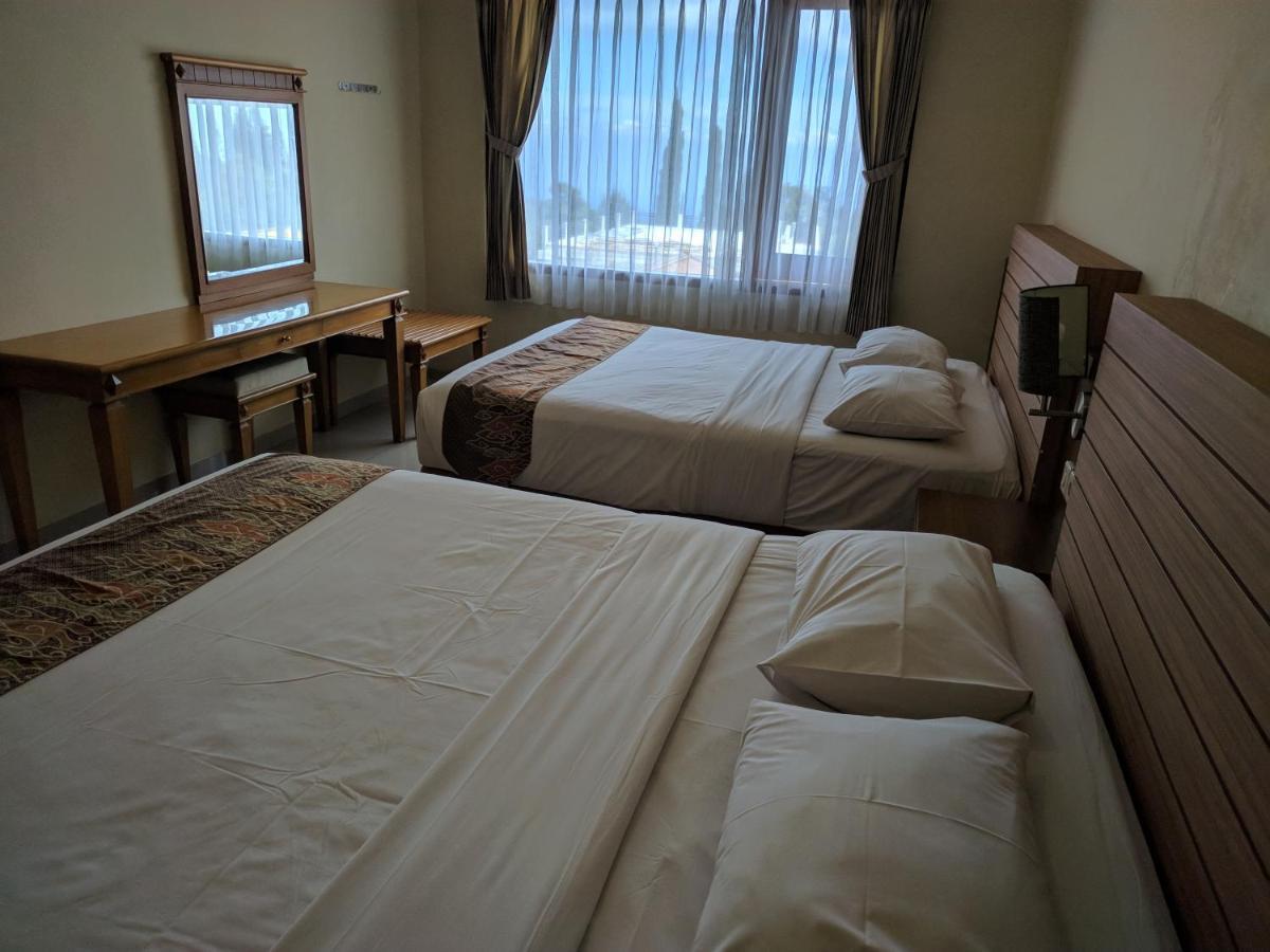 Hotel Pondok Asri ตาวังมางู ภายนอก รูปภาพ